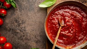 When to add tomato paste to sauce